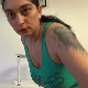 A mature, European woman speaks to the camera (In English), then takes a piss while standing and a solid shit while sitting on a makeshift potty chair. She shows us her dirty asshole before a closer look at her poop pile on the floor.  About 9.5 minutes.